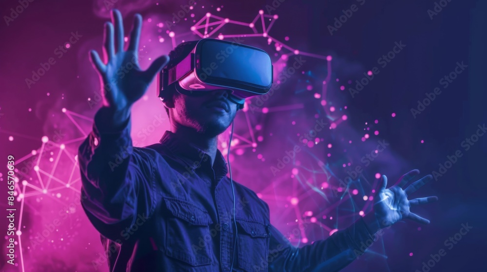 Fototapeta premium Person wearing a VR headset is immersed in a vibrant, neon-lit digital environment with geometric patterns. The scene represents the futuristic and immersive experience of virtual reality technology.
