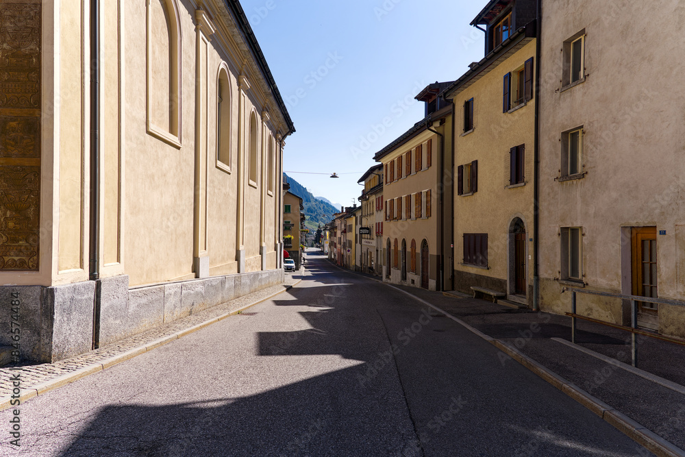 Scenic view of alley at Swiss mountain village Airolo on a sunny late summer noon. Photo taken September 10th, 2023, Airolo, Canton Ticino, Switzerland. Scenic view of alley at Swiss mountain village Airolo on a sunny late summer noon. Photo taken September 10th, 2023, Airolo, Canton Ticino, Switzerland.