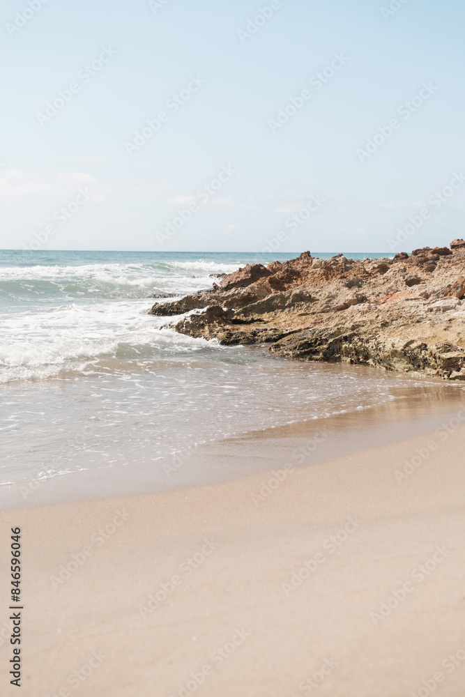 Peaceful isolated beach with gentle waves Peaceful isolated beach with gentle waves