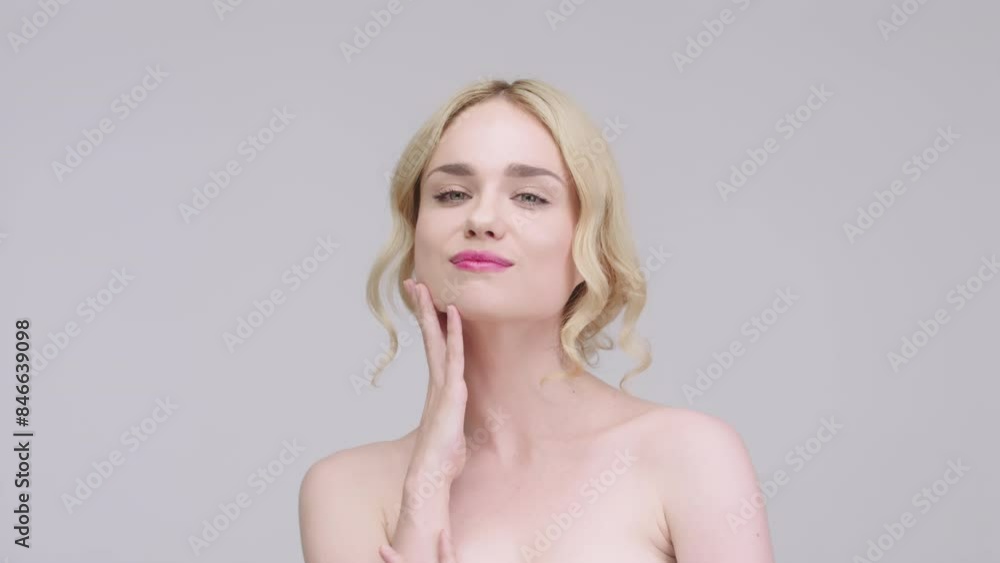 Incredible, sensual, tender blonde on a light background with isolated space for your advertising. Cosmetology concept. Close-up portrait of a charming half-naked woman in the studio. Incredible, sensual, tender blonde on a light background with isolated space for your advertising. Cosmetology concept. Close-up portrait of a charming half-naked woman in the studio.