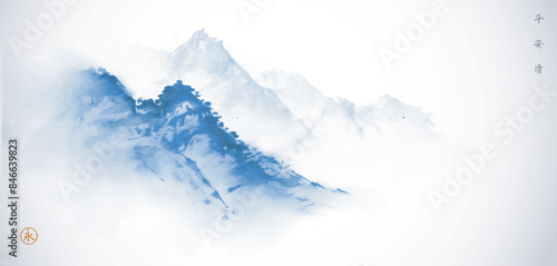 Ink painting with blue misty mountains. Traditional oriental ink painting sumi-e, u-sin, go-hua. Hieroglyphs - peace, tranquility, clarity, eternity