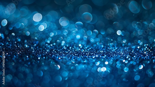 Sapphire glitter bokeh background. Unfocused shimmer royal blue sparkle. Crystal droplets wallpaper --