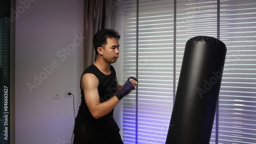 he is practicing boxing in his private gym, exercise is good for heath that is why he likes to do boxing, training in the gym to make his body strength and that is his motivation