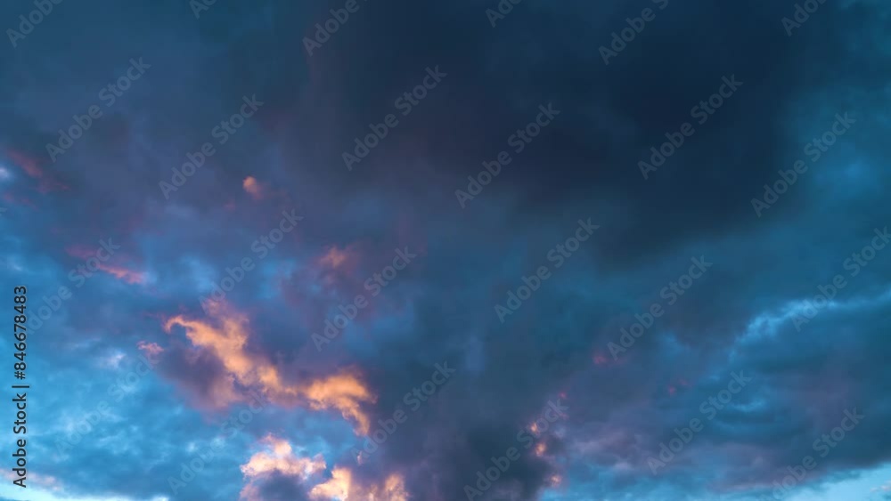 Cumulus white clouds fly across the blue sky before sunset Cumulus white clouds fly across the blue sky before sunset