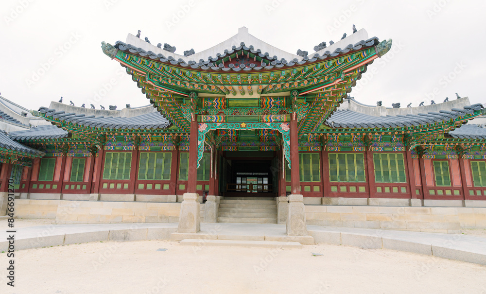 Changdeokgung Palace’s ornate architecture in Seoul, showcasing intricate designs, vibrant colors Changdeokgung Palace’s ornate architecture in Seoul, showcasing intricate designs, vibrant colors