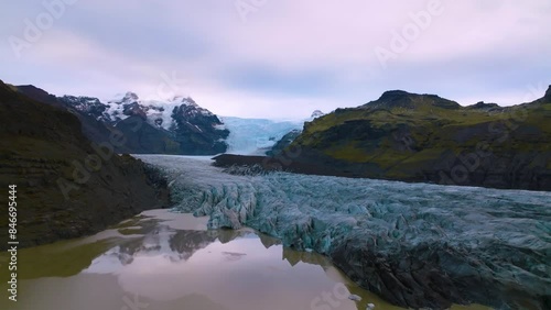 Aerial drone view of Svinafellsjokull Glacier, part of Vatnajokull glacier, South-East of Iceland photo