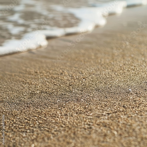 Close Up of Sand and Water on a Beach