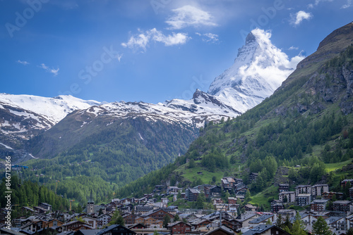 we stay at Zermatt village and see matterhorn in sunny cloudy sky day .it is very beautiful .