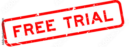 Grunge red free trial word square rubber seal stamp on white background