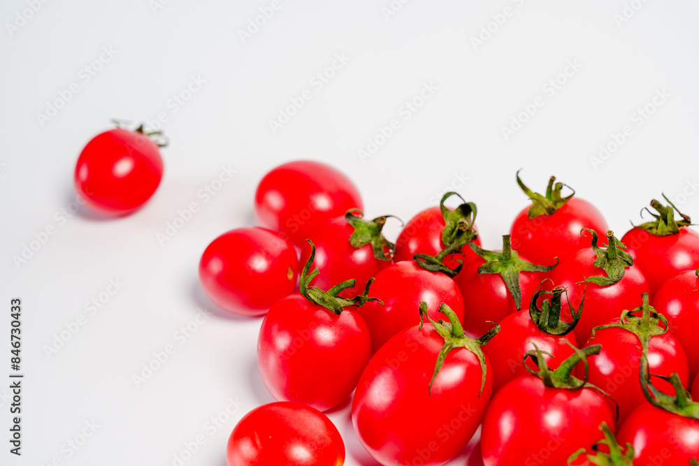 Studio shot photo of cherry tomato against white background Studio shot photo of cherry tomato against white background