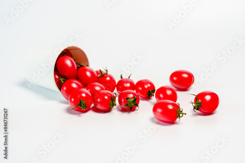 Studio shot photo of cherry tomato against white background