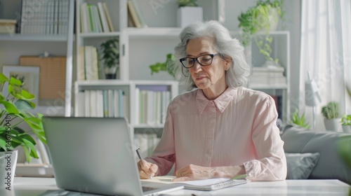 Wallpaper Mural The senior woman at desk Torontodigital.ca