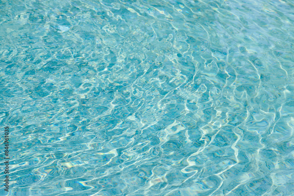 Obraz premium abstract blue color water wave in swimming pool pure natural swirl pattern texture