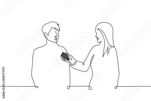 man gives an interview to a woman with a buttonhole - one line art vector. interview concept, eyewitness commentary, social street survey
