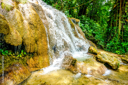 Konoko Falls in Jamaica known for its 4 different sets of falls and ,multi-step formation, with pristine lakes and streams.