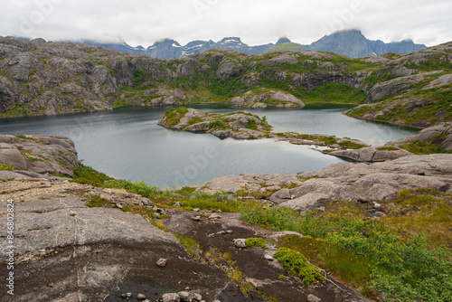 Mountain lakes in Lofoten islands, Nordland, Norway. Hiking in wild nature of Lofoten islands. 