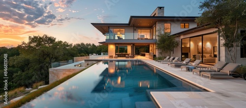 Showcasing a contemporary home with a pool in its exterior