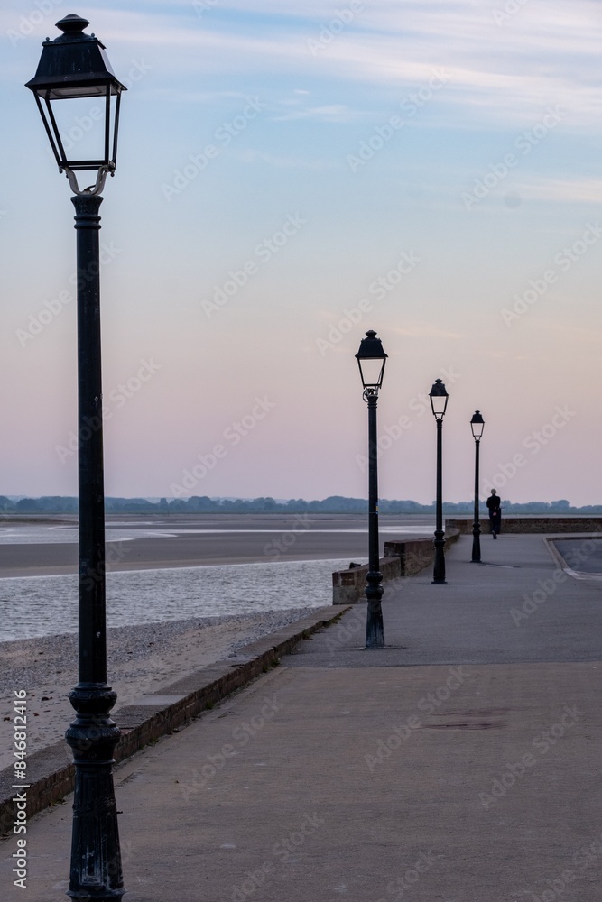 unlit lanterns on the coastal road in the dark unlit lanterns on the coastal road in the dark