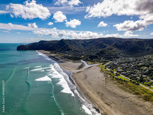 Wallpaper Mural Small town of Piha in North Auckland perched laong black sandy coast and surrounded by thick bush and mountains.  Torontodigital.ca