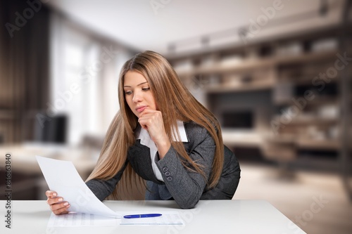 Young smiling woman wear casual read documents at home