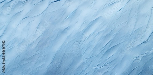 Wallpaper Mural light blue texture of snow on the ground a snowboarder glides down a snow - covered slope, with a clear blue sky overhead and a distant mountain range visible in the background Torontodigital.ca