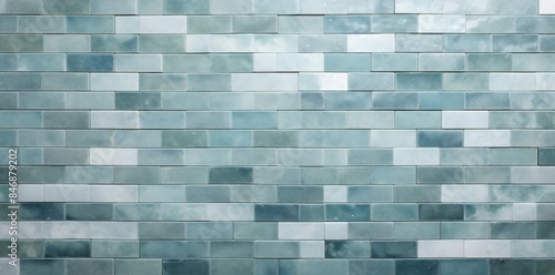 bathroom tiles textured on a wall a row of tiles arranged in a row from left to right, including a white tile, a green tile, a blue tile, and a black tile © Siasart Studio