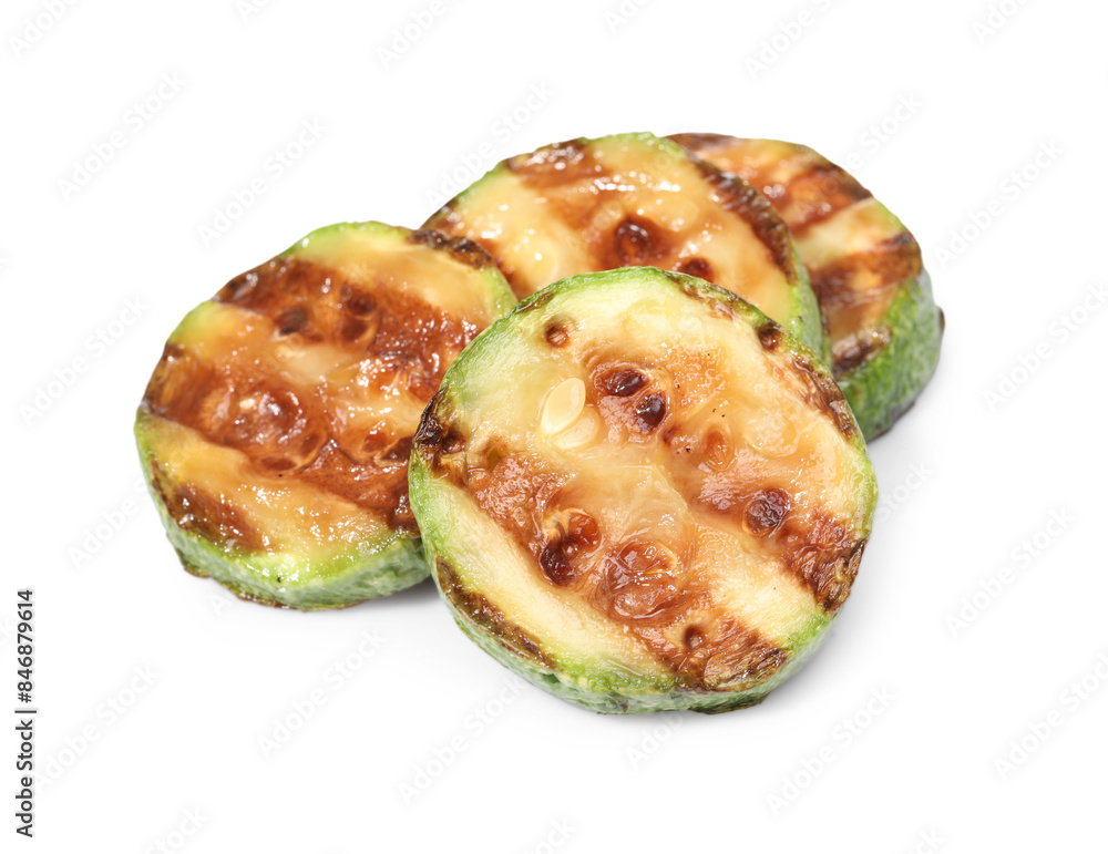 Slices of delicious grilled zucchini isolated on white Slices of delicious grilled zucchini isolated on white