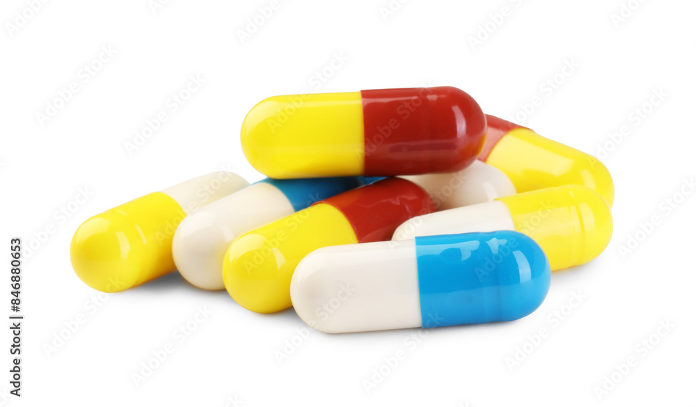 Many antibiotic pills isolated on white. Medicinal treatment Many antibiotic pills isolated on white. Medicinal treatment
