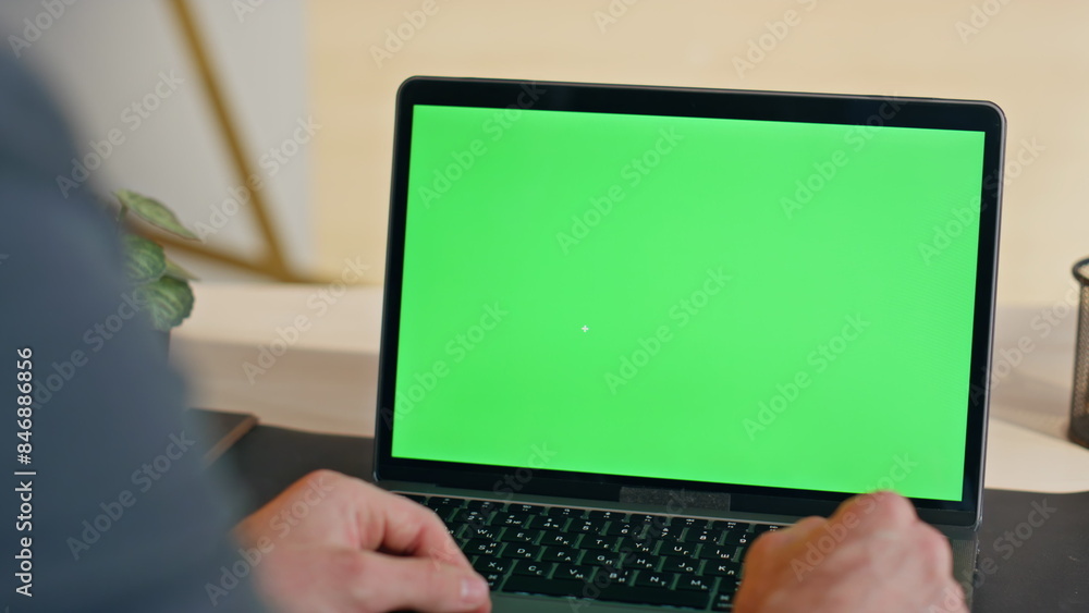 Unrecognizable person using mockup laptop computer working alone at home closeup Unrecognizable person using mockup laptop computer working alone at home closeup