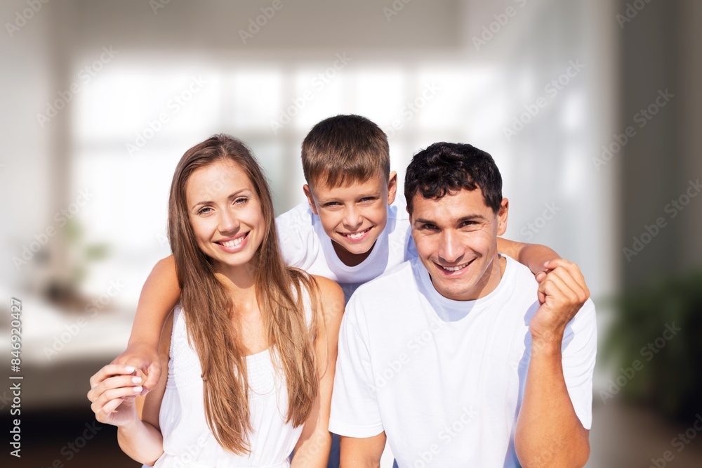 Obraz premium Happy young Parents With child have fun at home