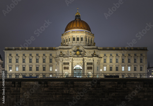 The Berlin Palace (Berliner Schloss) at night, which houses the Humboldt Forum museum building, is a museum dedicated to human history, art and culture, Space for text, Selective focus.