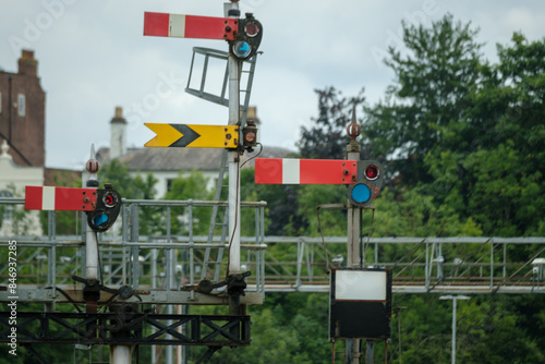 Junction semaphore home signal with distant for main route. Junction indicator on subsidiary signal.Worcester Shrub Hill