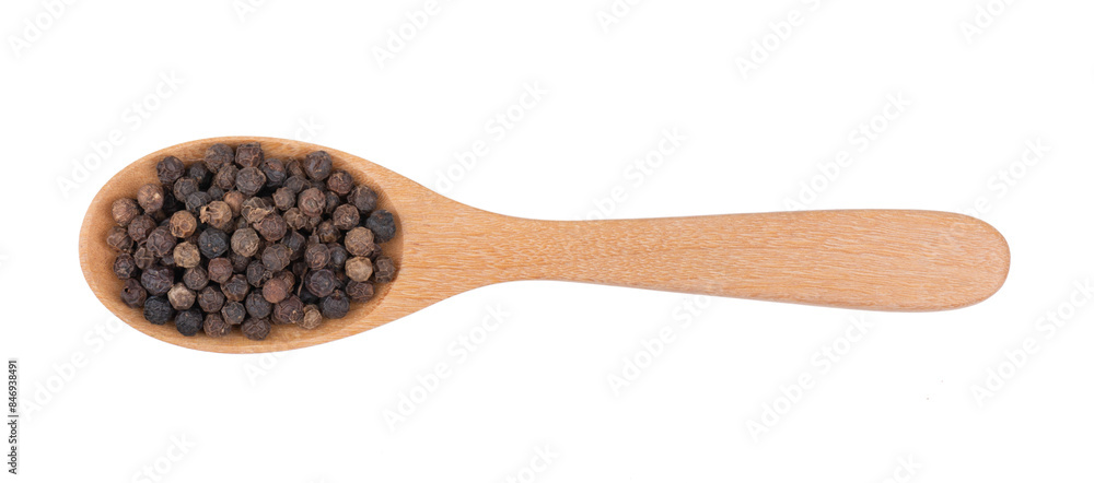 Black pepper corns in wood spoon isolated on transparent png top view