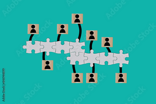 Allocation of goals and objectives to individuals in a separate business process on paper blue background