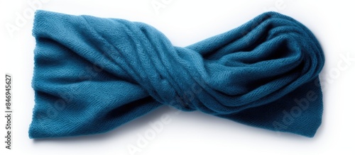 Close-up view of a stylish blue bow tie placed on a plain white surface. with copy space image. Place for adding text or design