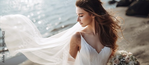 Happy bride in elegant whit...