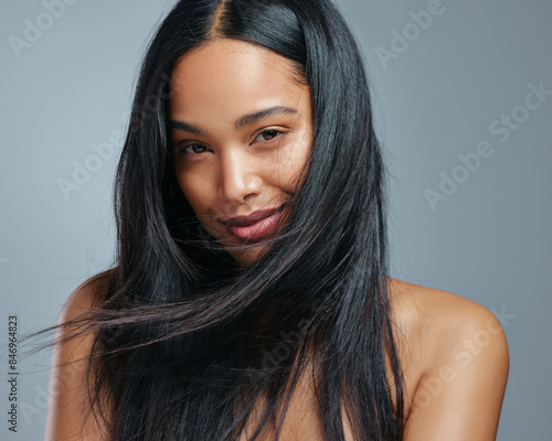 Fotografía Woman, portrait and hair care in studio with beauty from salon treatment, cosmetics and shampoo shine