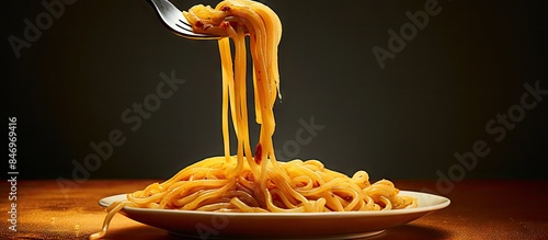 Fork raising plate of spagh...