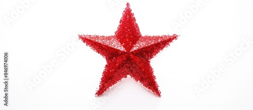 In focus, a red star shines...