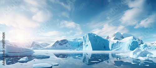Icebergs drift on a lake ag...