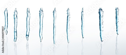 Several toothbrushes are neatly lined up in a row on a clean white surface. with copy space image. Place for adding text or design