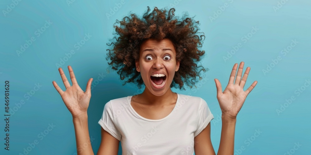 A person with an astonished facial expression A person with an astonished facial expression