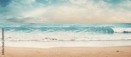 Surfboard lying on sandy sh...