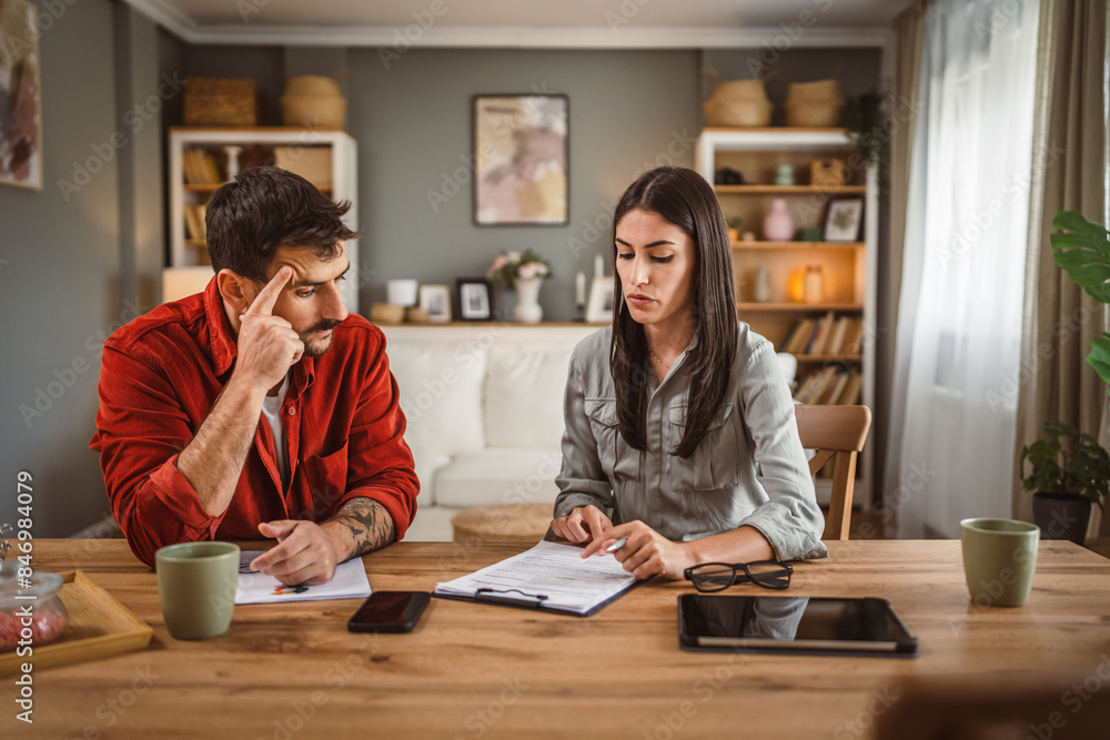 woman financial adviser explain the insurance policy to the men client woman financial adviser explain the insurance policy to the men client