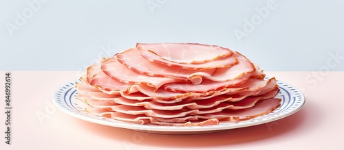 Thin slices of pork ham arr...
