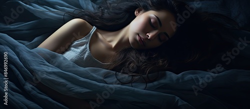 Woman peacefully sleeping o...