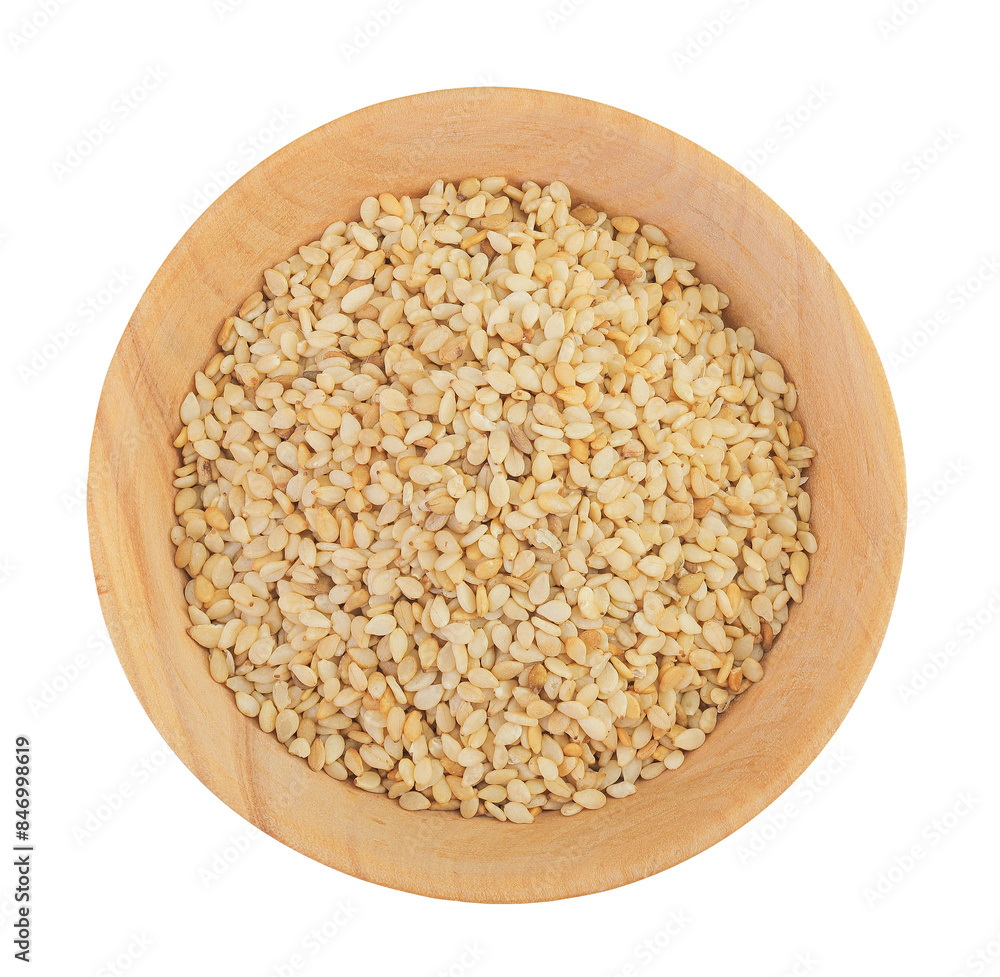 Sesame seeds in wooden bowl isolated on white background. Top view. Flat lay Sesame seeds in wooden bowl isolated on white background. Top view. Flat lay