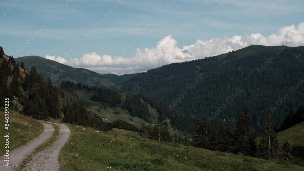 empty road with mont blanc in the background in the french alps at summer empty road with mont blanc in the background in the french alps at summer