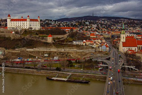 View of the Bratislava Castle, St. Martin Cathedral, the SNP or UFO Bridge, Danube river and old town from the observation deck of Ufo tower, Bratislava, Slovakia photo