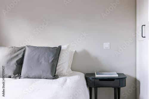 bedroom with minimalist decoration in monochromatic tones photo